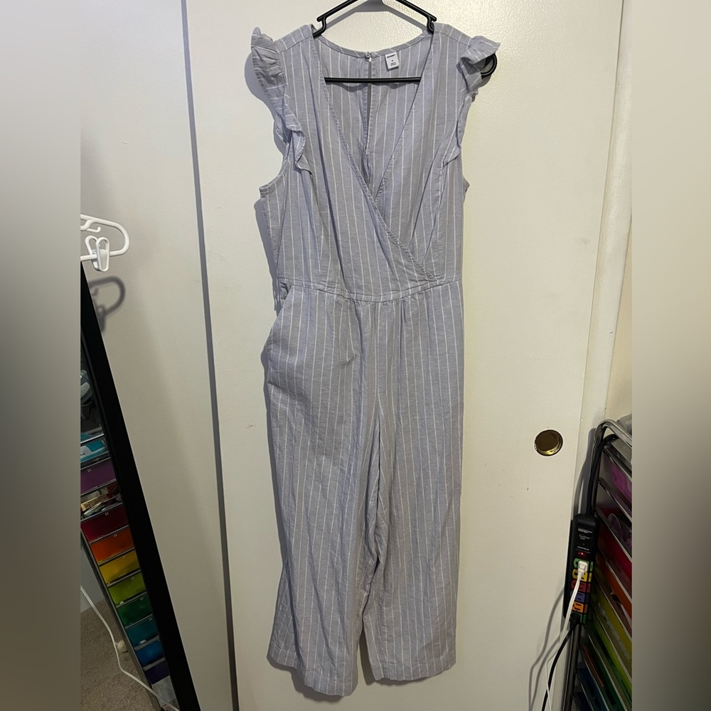 Blue and white pinstripe ruffled jumpsuit